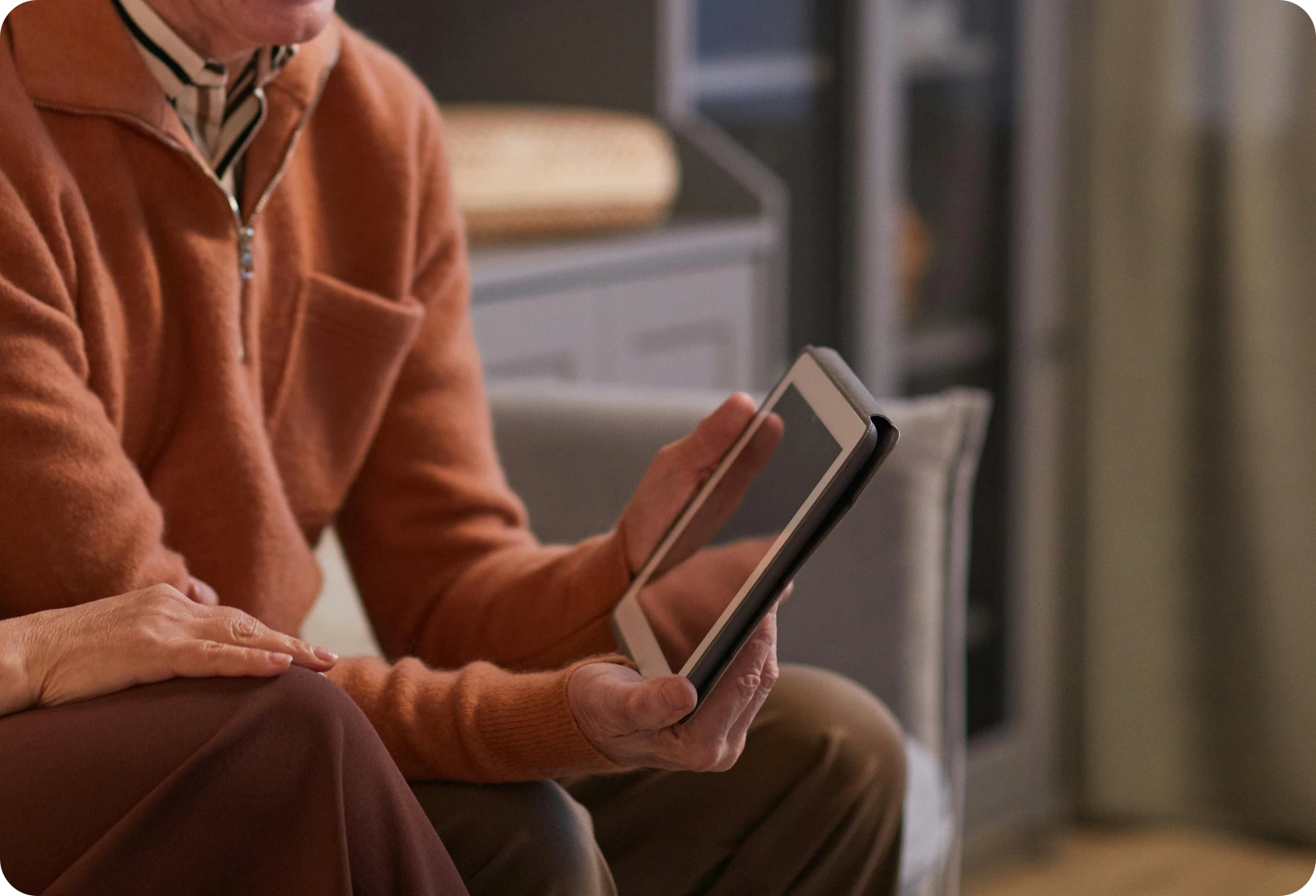 Elderly couple using laptop
